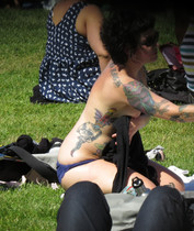 Free porn pics of Topless tanning on city park  8 of 104 pics