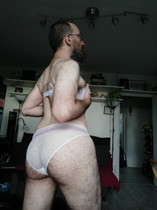 Free porn pics of Crossdresser in Short Shorts and Chastity Cage 24 of 30 pics