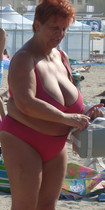 Free porn pics of Red-haired granny at the beach 62 of 185 pics