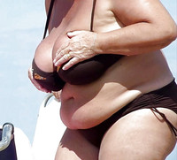 Free porn pics of Red-haired granny at the beach 19 of 185 pics