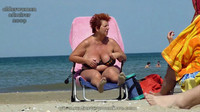 Free porn pics of Red-haired granny at the beach 20 of 185 pics