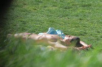 Free porn pics of Topless tanning on city park  84 of 104 pics