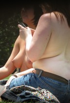 Free porn pics of Topless tanning on city park  14 of 104 pics