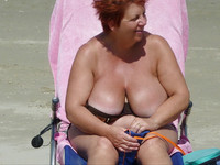 Free porn pics of Red-haired granny at the beach 16 of 185 pics