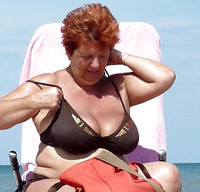 Free porn pics of Red-haired granny at the beach 33 of 185 pics