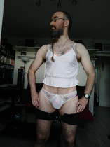 Free porn pics of Crossdresser in Short Shorts and Chastity Cage 15 of 30 pics