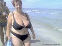 Free porn pics of Red-haired granny at the beach 12 of 185 pics